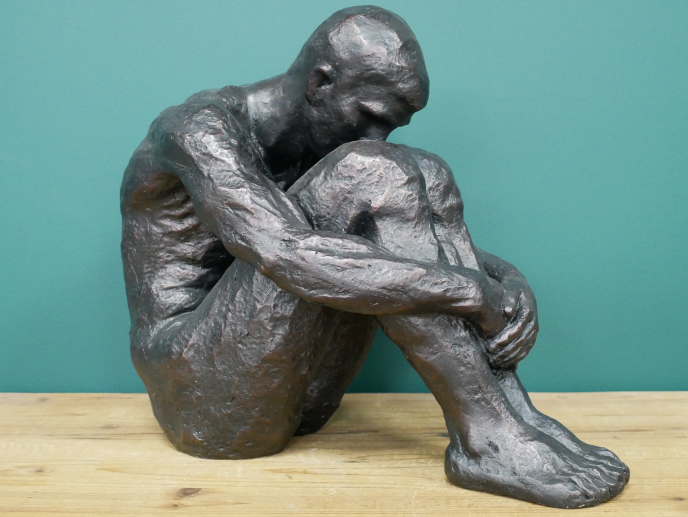 Sitting Man Sculpture