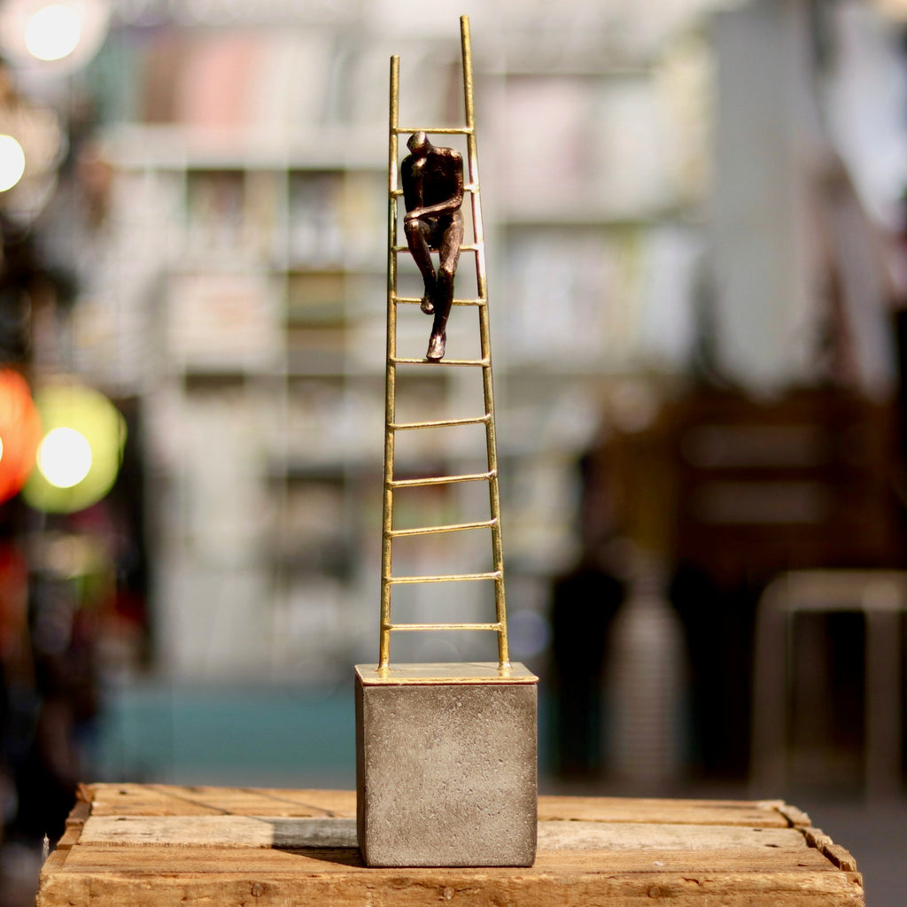 Thinking Man on  a Gold Ladder